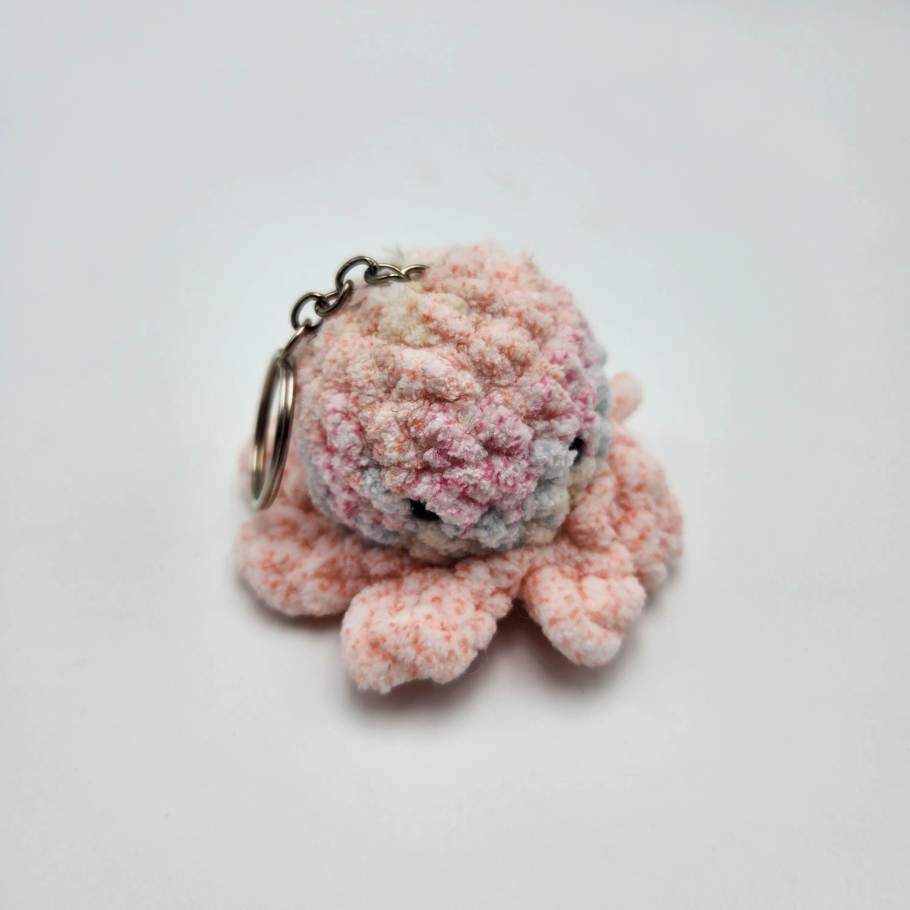 Poulpe en crochet coloris rose pâle chiné